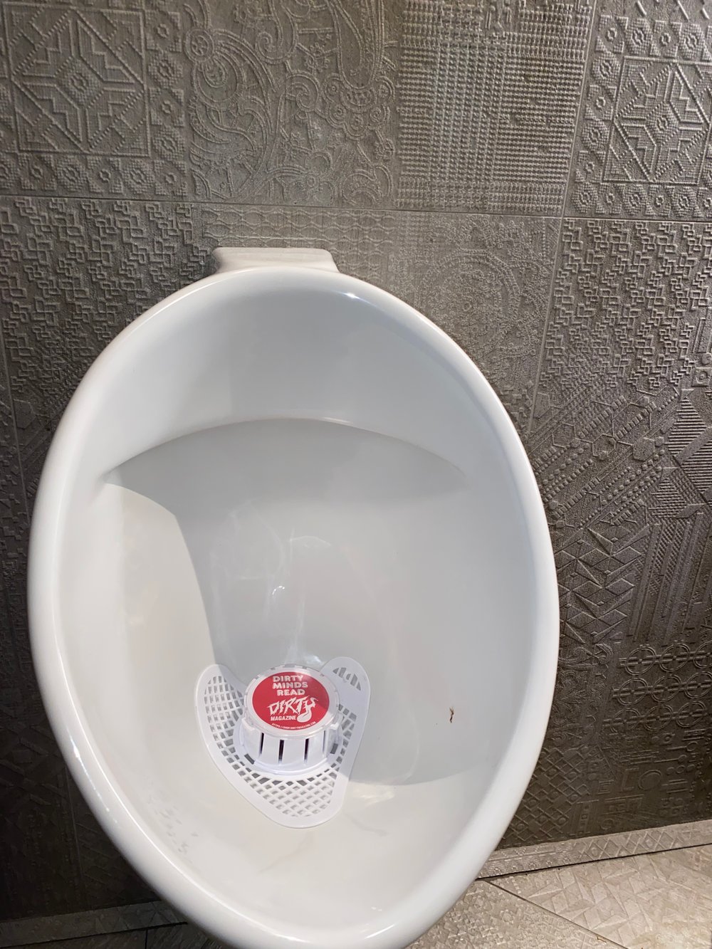 Image of Dirty Urinal Cake 