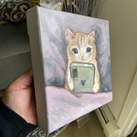 Image 3 of doomscrolling kitty 🤳