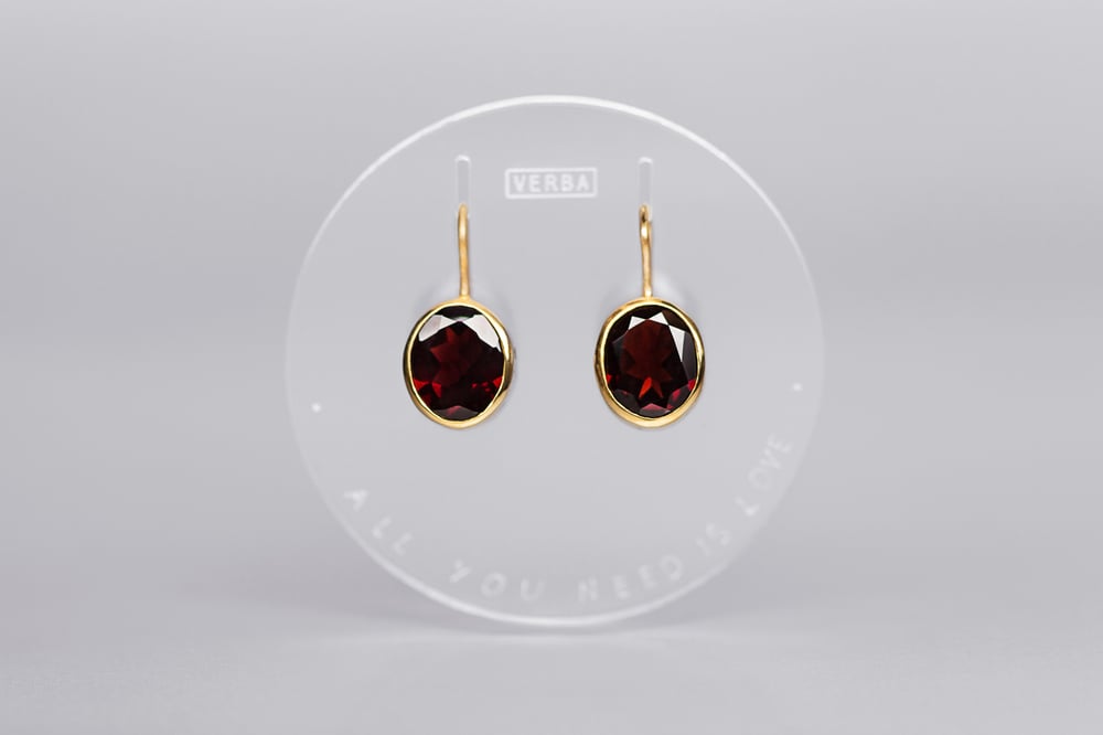 Image of "Love is all you need" gold plated silver earrings with garnets  · AMORE TANTUM OPUS EST ·