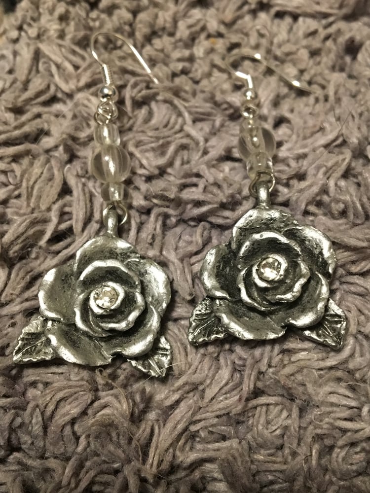 Image of Silver coloured earrings
