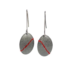 Image of Sewn Up large oval earrings