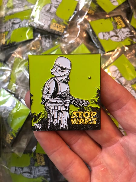 Image of stop wars hat pin