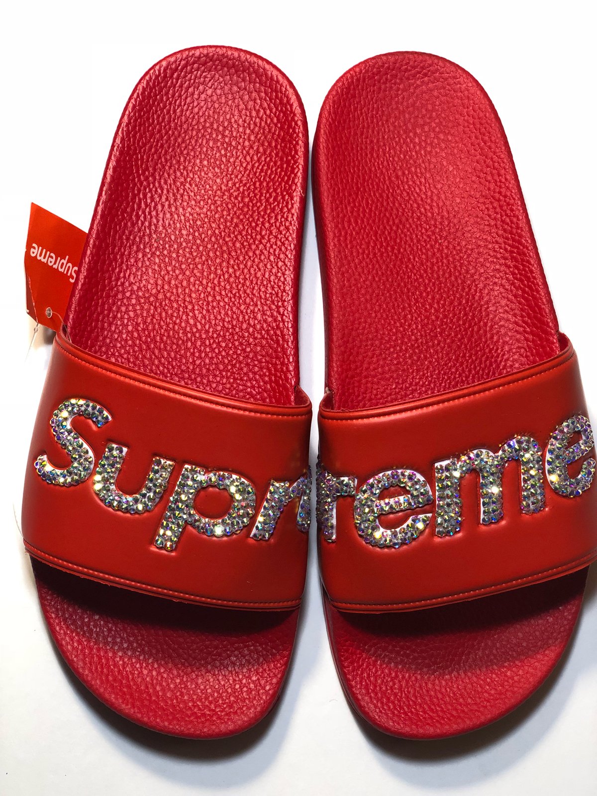 Red supreme store flip flops