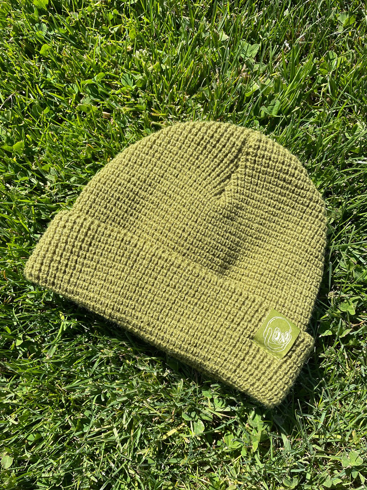 Skull Logo Fisherman Beanie | EMMA ATTERBURY