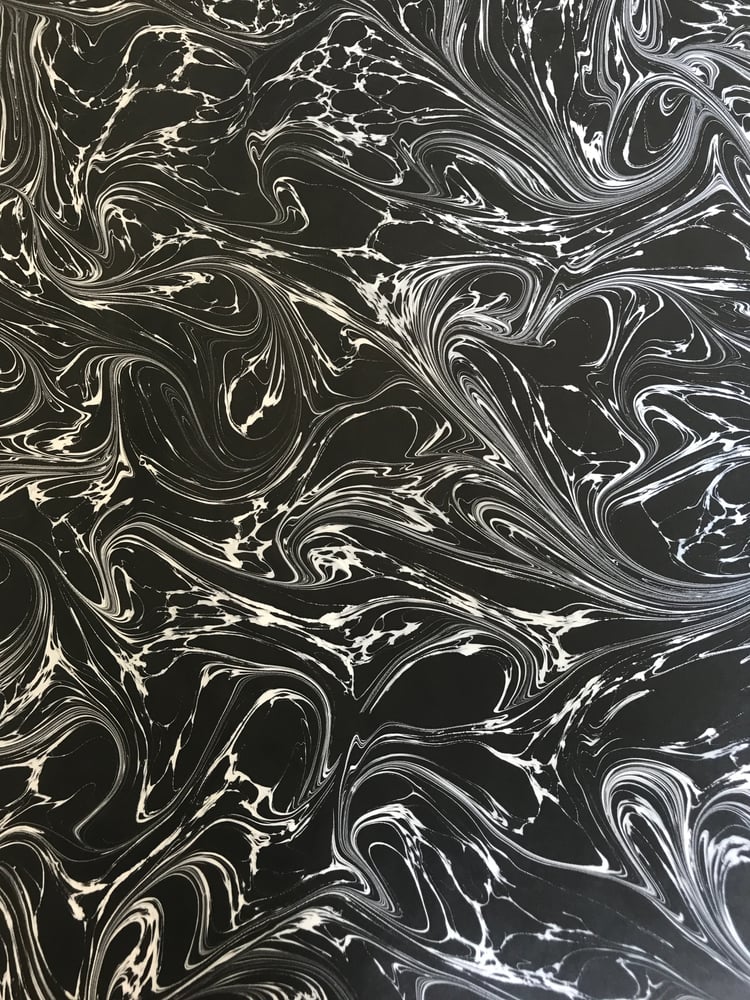 Image of Marbled Paper #38 'White Fantasy vein' on Black paper