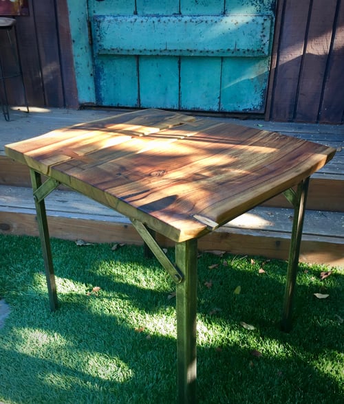 Image of Claro walnut triple bowtie side table