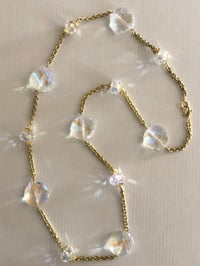 Image 1 of clear faceted quartz crystals& gold chain