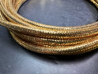 Image 2 of THE GOLDEN LASSO