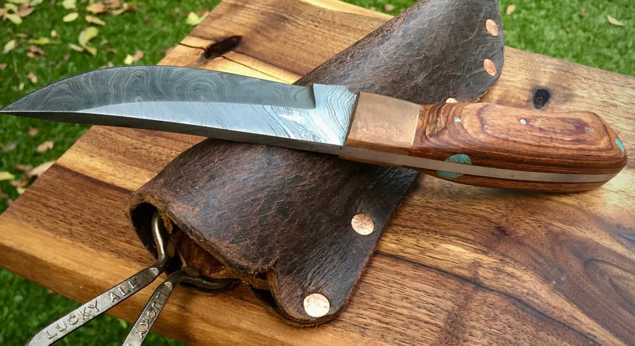 Image of Damascus forged steel knife with black walnut scales