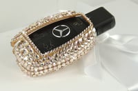 Image 2 of Mercedes Key Case in Rose Gold, Midnight Black, Gold and Silver/White.