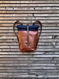 Image 1 of Backpack in oiled leather with waxed canvas roll to close top in waxed canvas