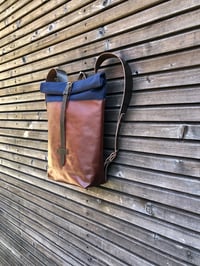 Image 2 of Backpack in oiled leather with waxed canvas roll to close top in waxed canvas