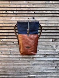 Image 4 of Backpack in oiled leather with waxed canvas roll to close top in waxed canvas