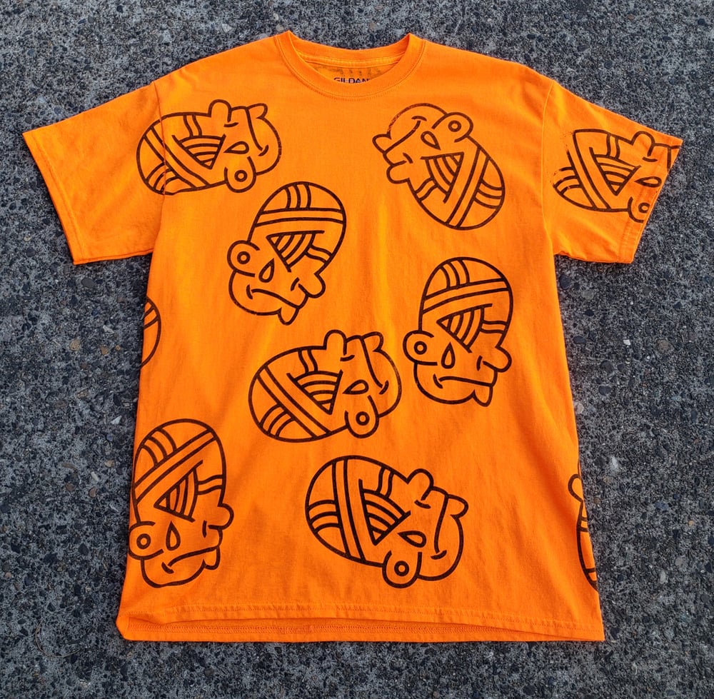 Image of ALL OVER FACE FOCUS T SHIRT IN ORANGE (SIZE M)