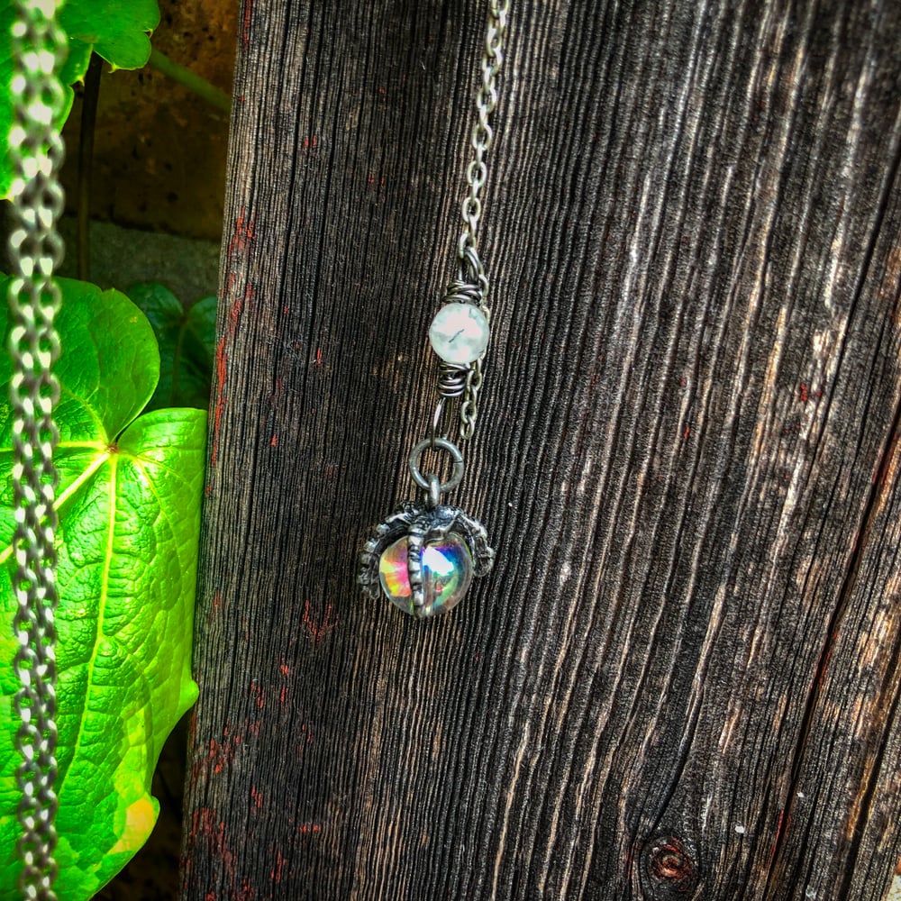 Image of Phoenix claw with Angel Aura Ball wth Rutilated Quartz Lariat