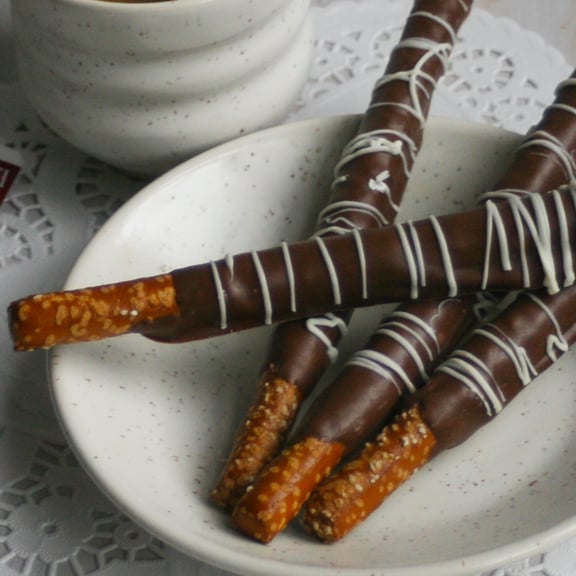 Image of Chocolate Dipped Pretzel Rods - (TWO DOZEN)