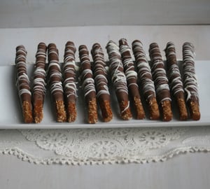 Image of Chocolate Dipped Pretzel Rods - (TWO DOZEN)