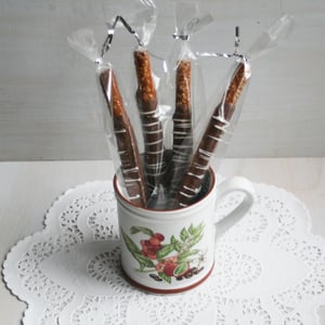 Image of Chocolate Dipped Pretzel Rods - (TWO DOZEN)