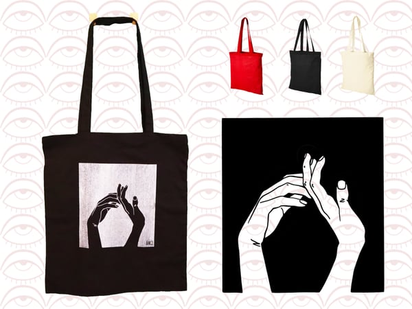 Image of hands tote 