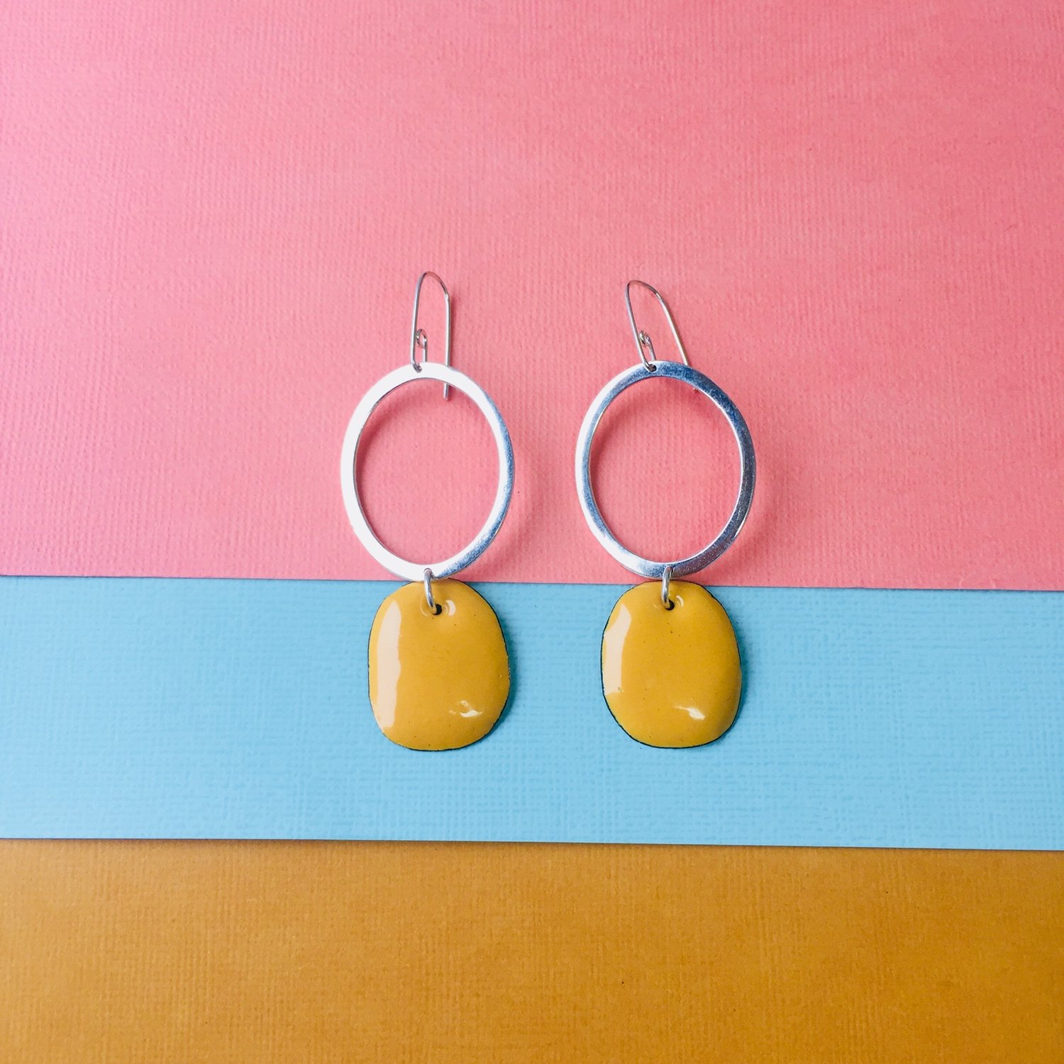 Image of Sterling silver hoop earrings with karma yellow enamel drops