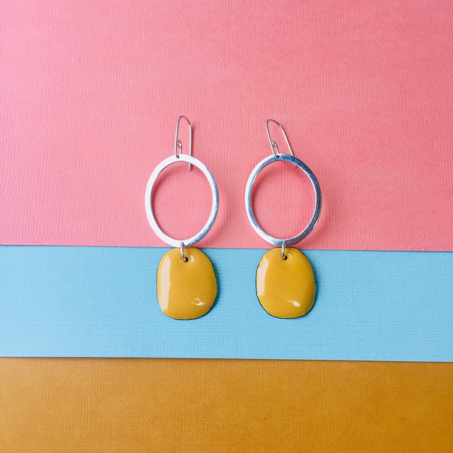 Image of Sterling silver hoop earrings with karma yellow enamel drops 