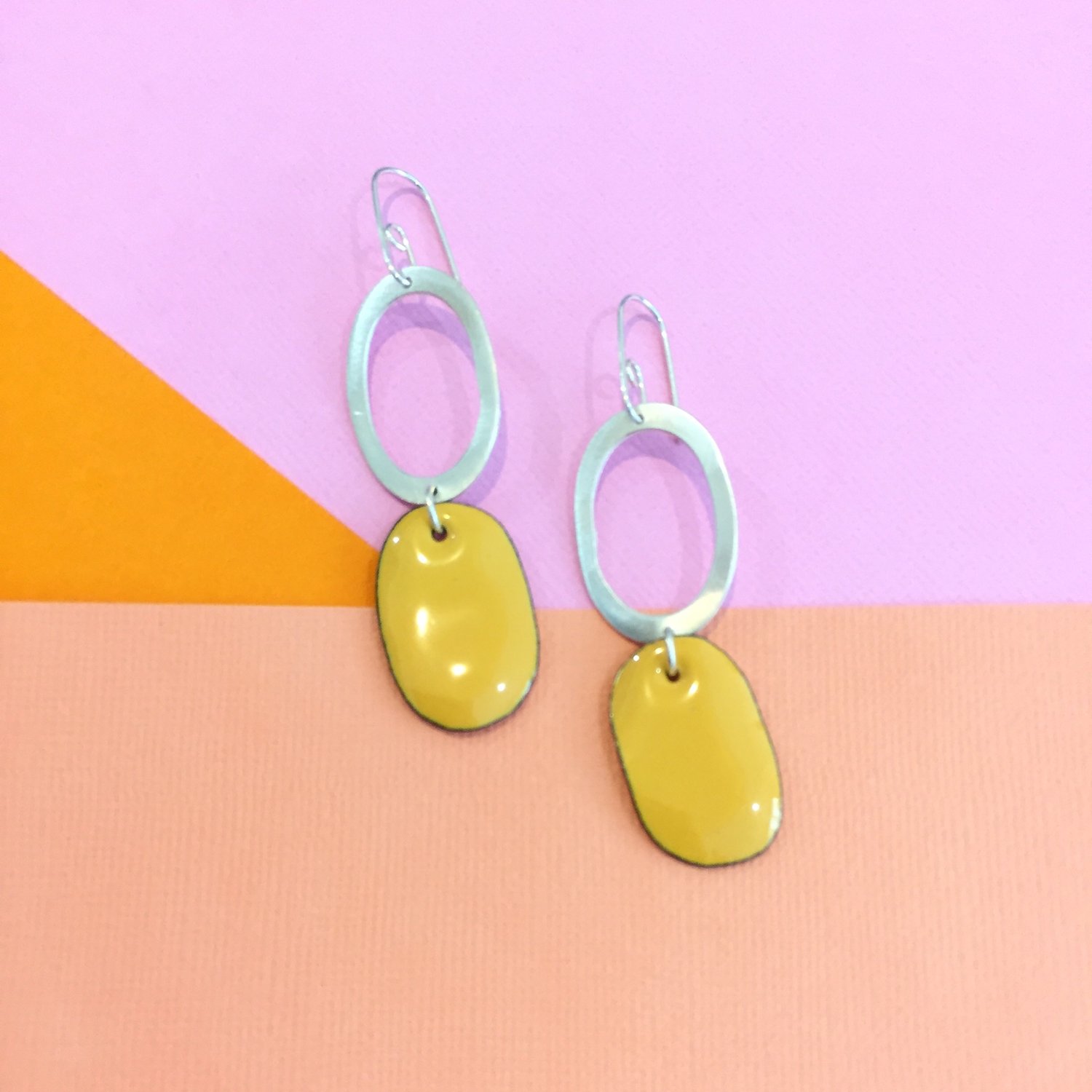Image of Handmade Sterling silver hoop earring with tangerine red enamel drop