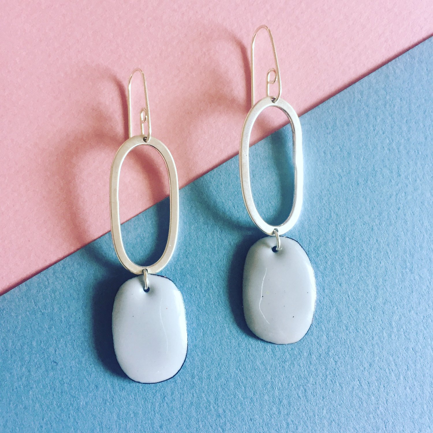 Image of Sterling silver hoop earrings with oval enamel drop