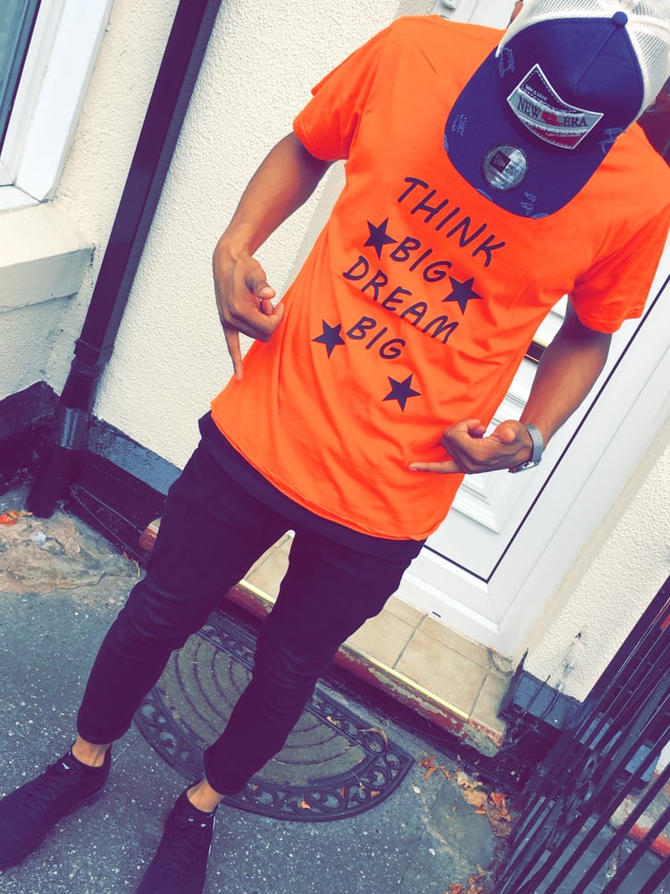 black shirt with orange writing