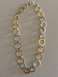 Image 1 of Necklace of gold & silver hammered rings