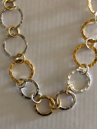 Image 2 of Necklace of gold & silver hammered rings