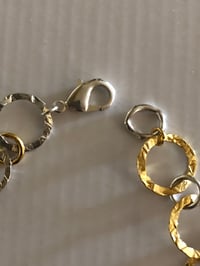 Image 3 of Necklace of gold & silver hammered rings