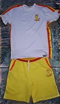 Image 1 of Yellow Goldie the giraffe shorts