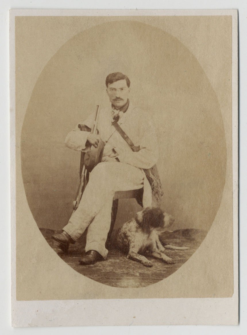 Image of CdV of an Italian hunter with his dog and rifle