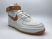 Image of NIKE AIR FORCE 1 HIGH “WHITE/BRONZE”