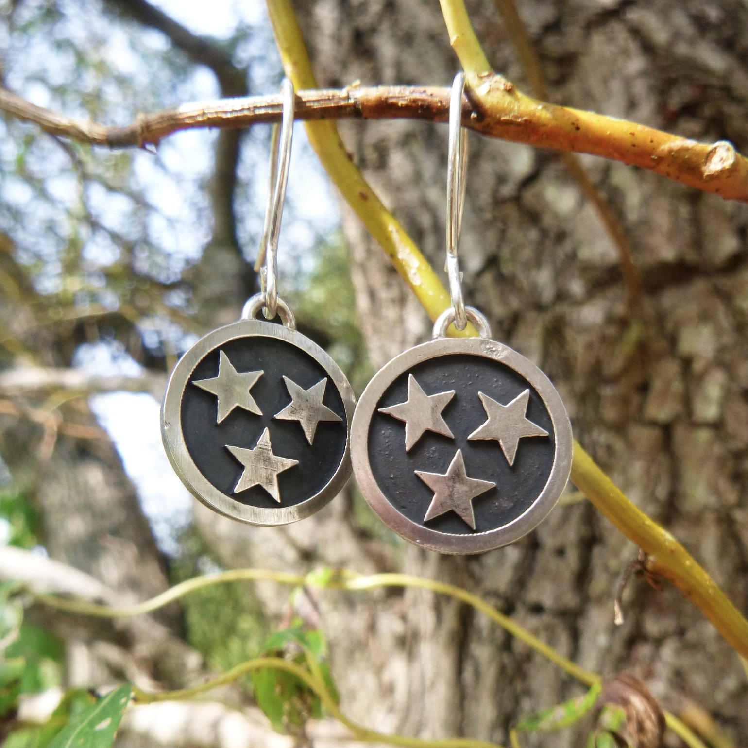 Image of Tri Star Drop Earrings in Silver