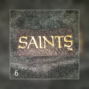 Image of New Orleans Saint Themed Towel Shorts
