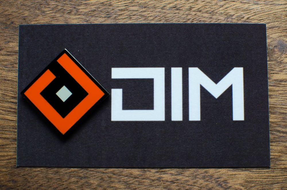 Image of DIM Logo Enamel Pin (Release Orange)