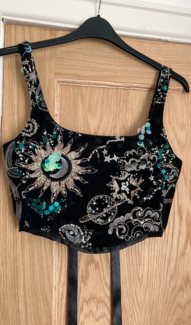 The Universe corset. Heavily embellished cosmic, star, sun and moon sequin corset in Black