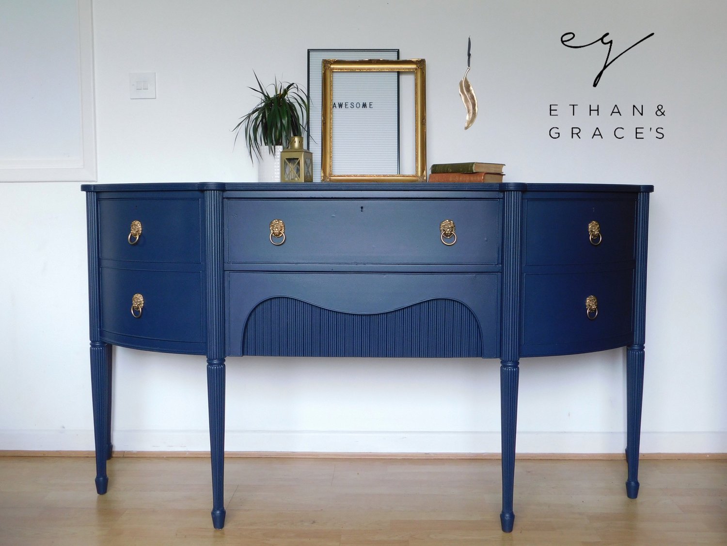 Image of A solid mahogany dark blue sideboard