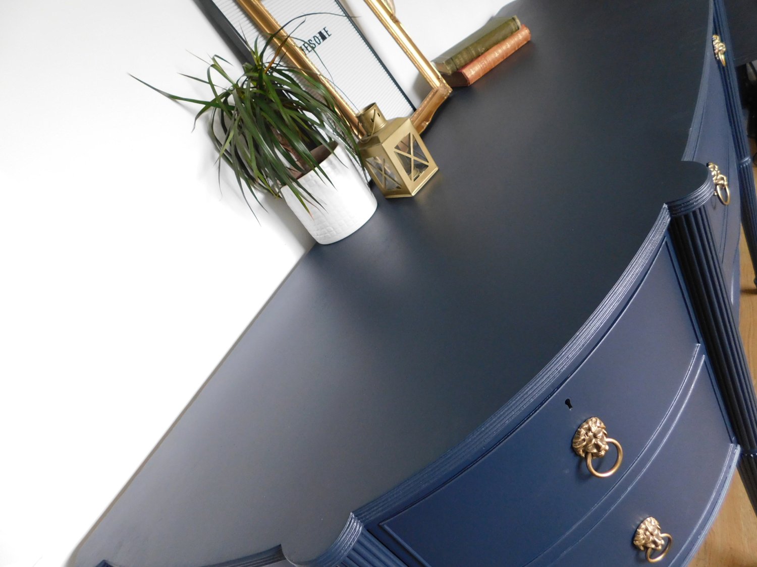 Image of A solid mahogany dark blue sideboard