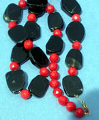 Image of Asynmetrical Onyx Slice and Coral Necklace