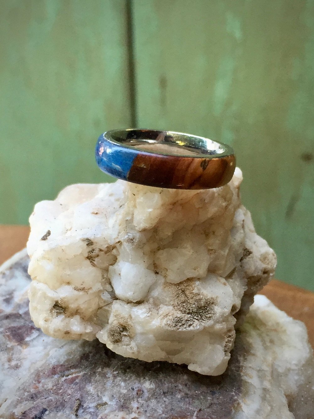 Image of Manzanita wood ring with brilliant blue resin