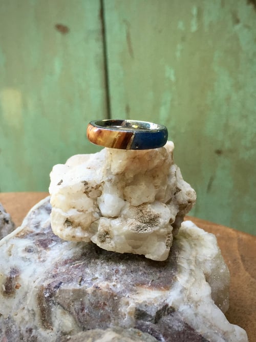 Image of Manzanita wood ring with brilliant blue resin