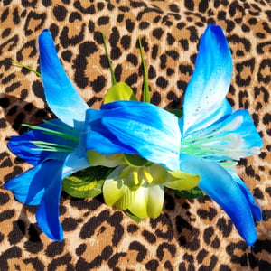 Image of Large Blue Lillies With Green Lillies Hair Flower