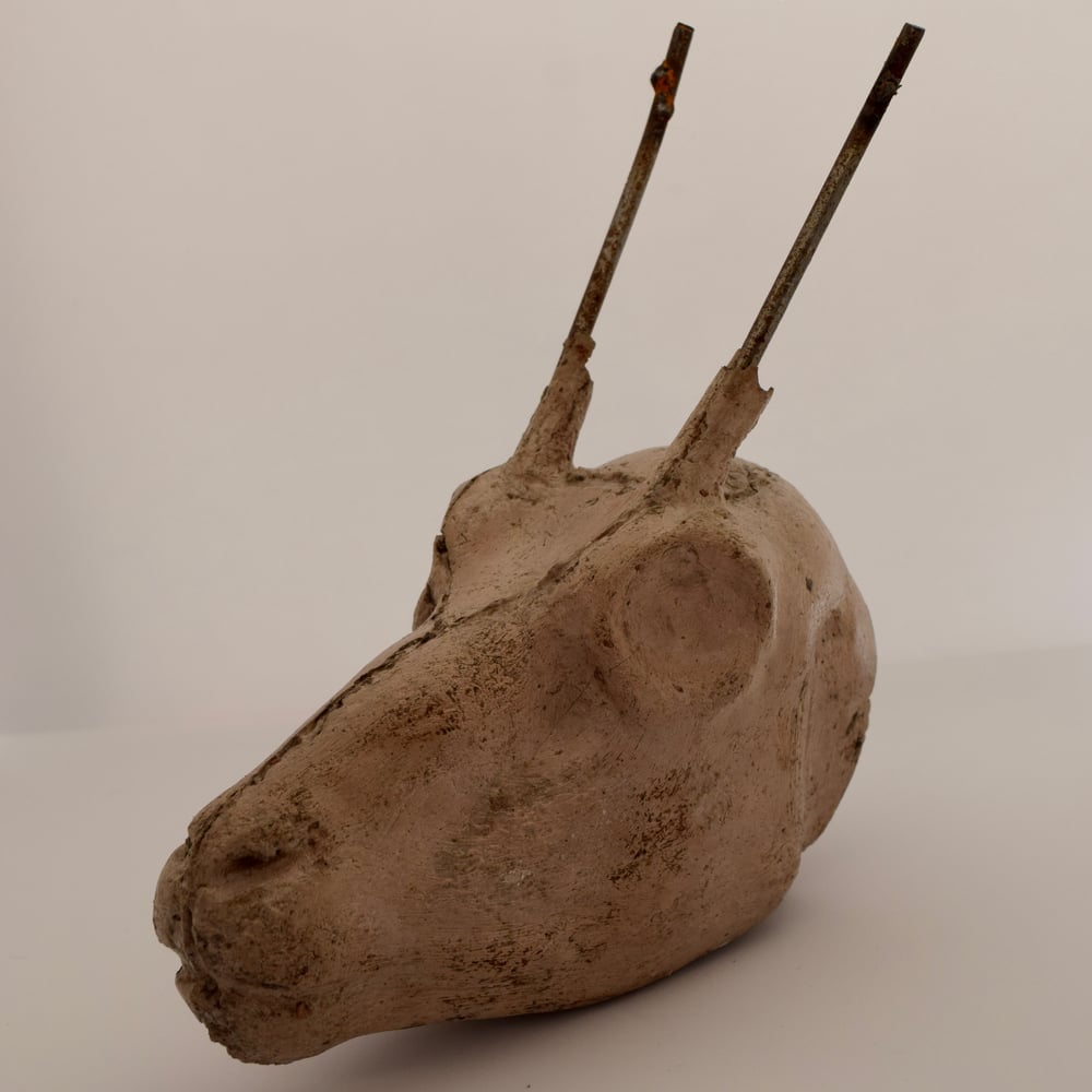 Image of Concrete antelope  head with welded antlers