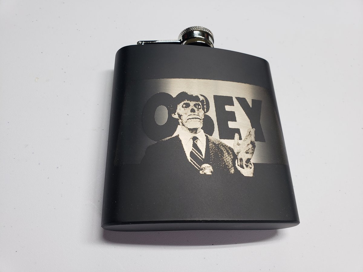 Image of They Live  6 oz flask. 