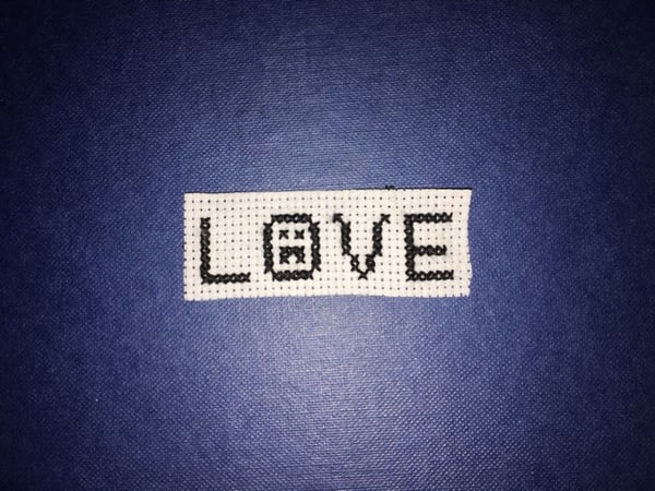 Image of Small Lil Peep "LOVE" tattoo patch.