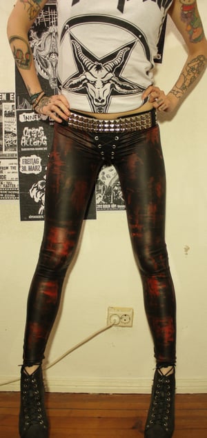 Image of Red-stained fauxleather pants