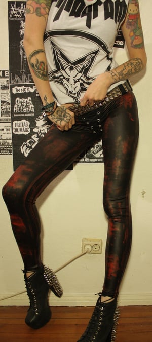 Image of Red-stained fauxleather pants