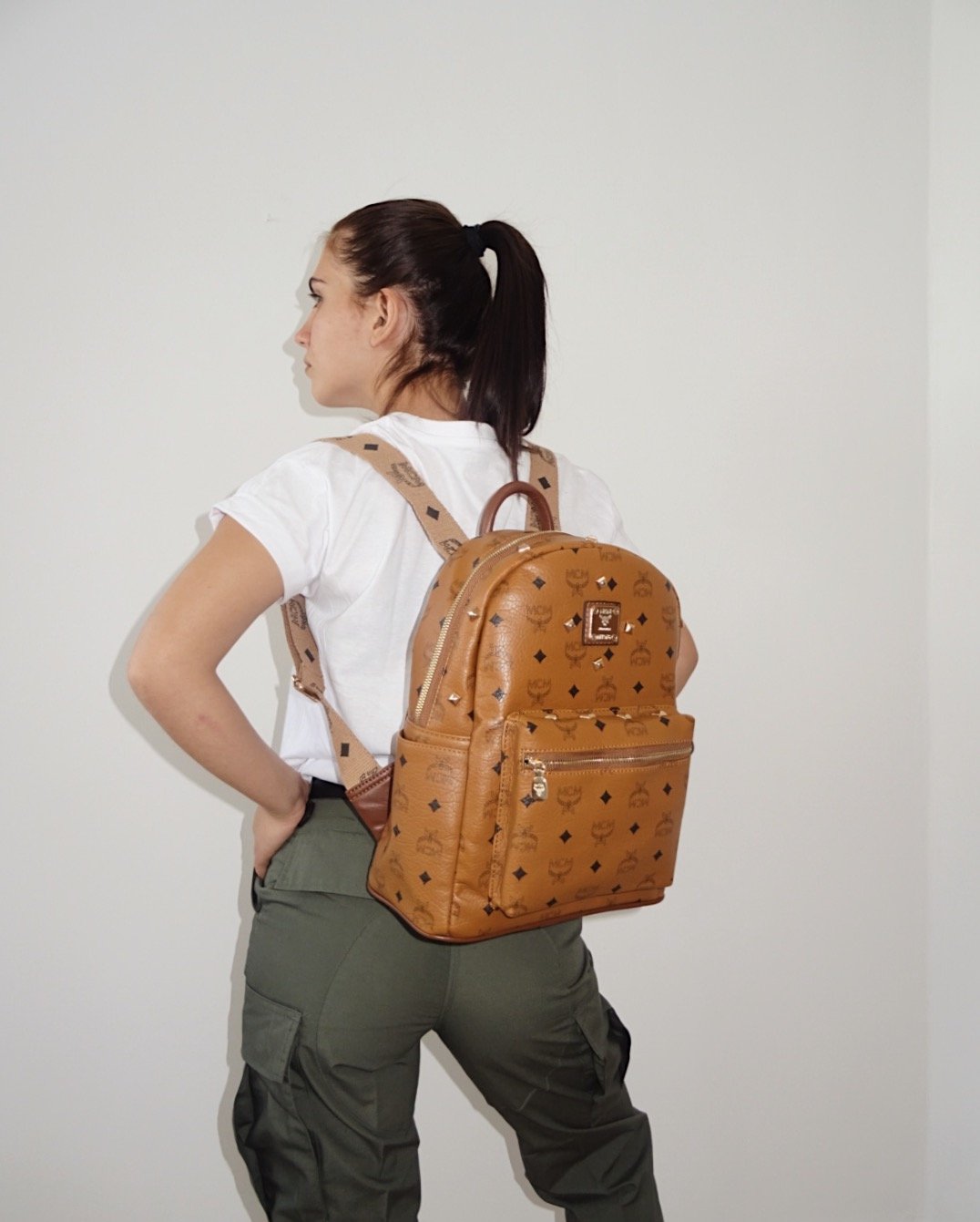 Image of STUDDED BROWN BACKPACK